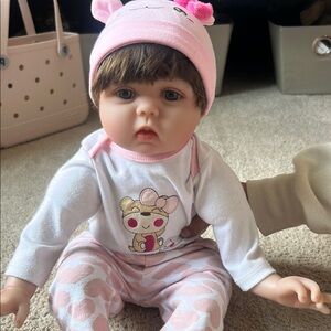 Adorable Baby Doll with Pink Outfit